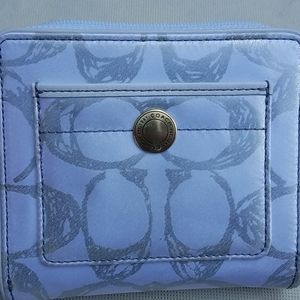 Coach medium zipper wallet in satin signature